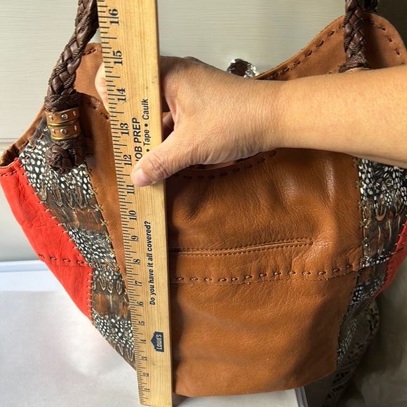 The sak large shoulder hobo purse brown/orange with a feather bird print - Picture 12 of 13